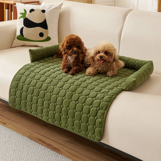 Two small dogs on quilted non-slip pet bed cover in beige
