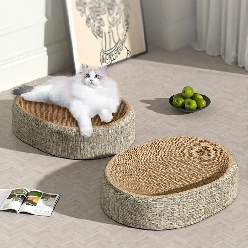Cat resting on oval sisal scratch pad bed
