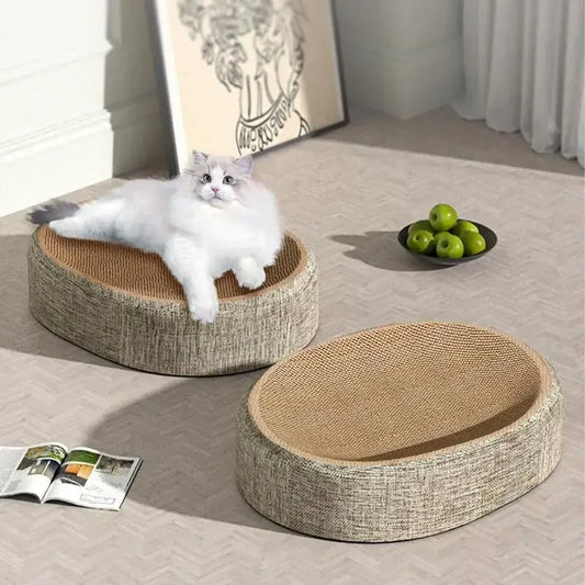 Cat resting on oval sisal scratch pad bed