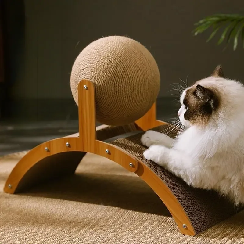 Cat scratching on wooden sisal ball scratcher