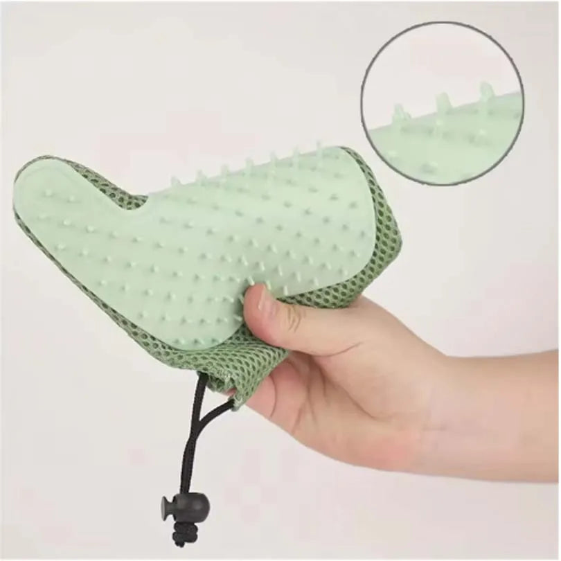 Dog during bath with pet grooming glove