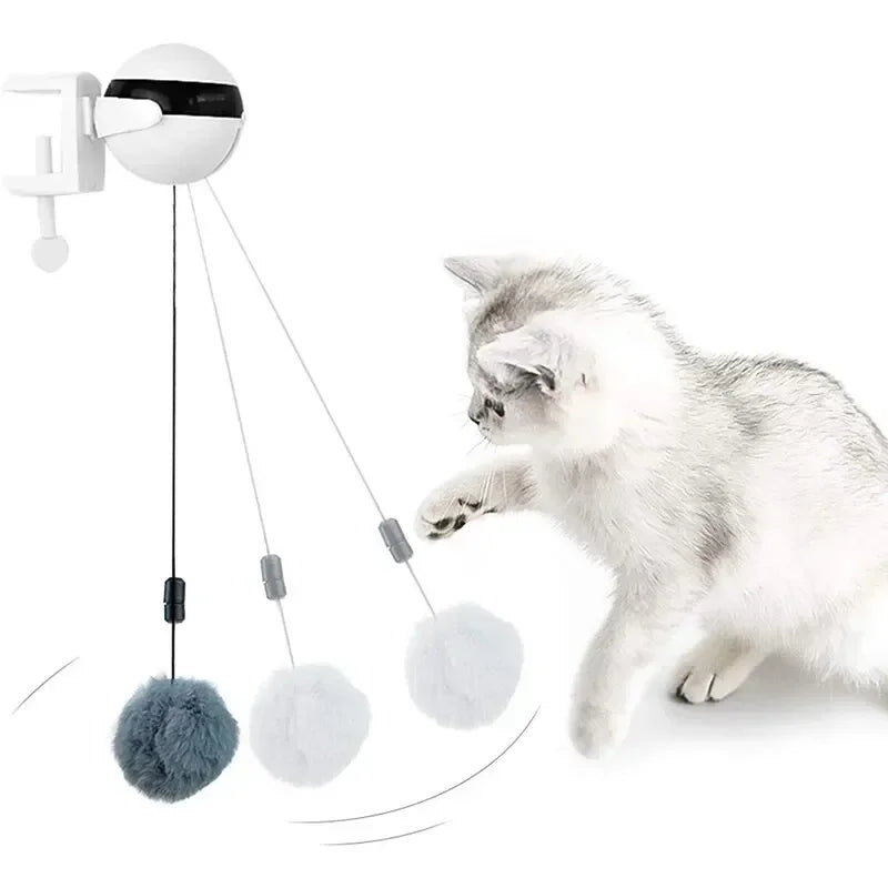 Electronic motion cat toy with dangling ball interactive play