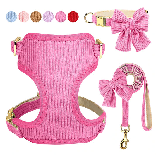 Pink dog harness, collar, and leash set with bowknot design