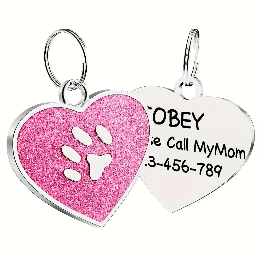 Silver engraved pet tag with paw design
