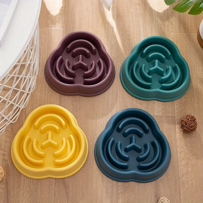 Dog eating from slow feeder food dish