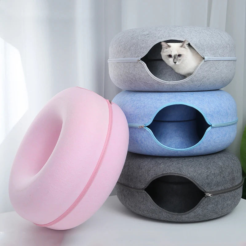 Pink donut cat bed with interactive play tunnel