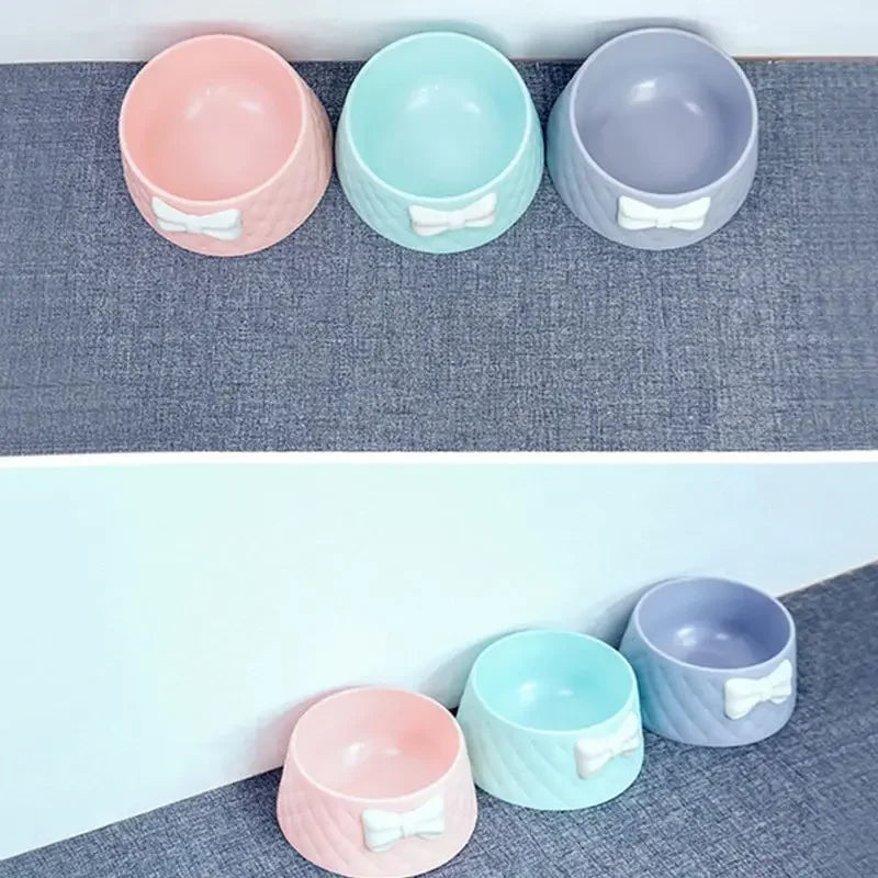 Set of colorful pet food bowls with non-slip base