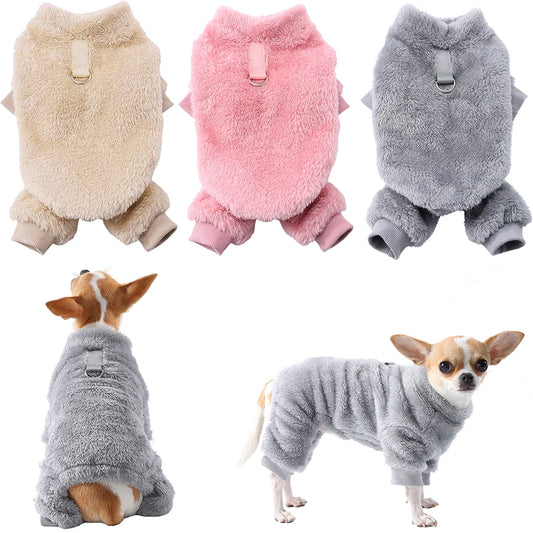 Small dog wearing pink fleece winter jumpsuit
