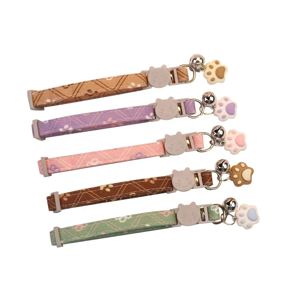 Set of colorful pet collars with bells for small pets