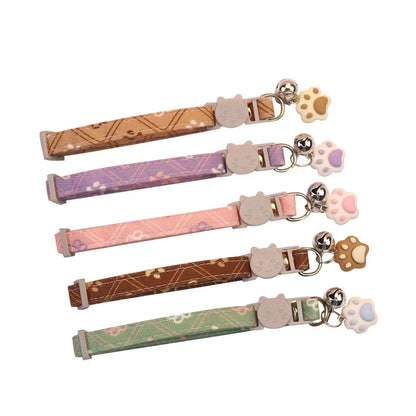 Set of colorful pet collars with bells for small pets