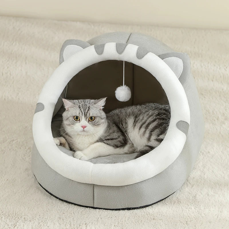 Gray cave-style cat bed with removable cushion