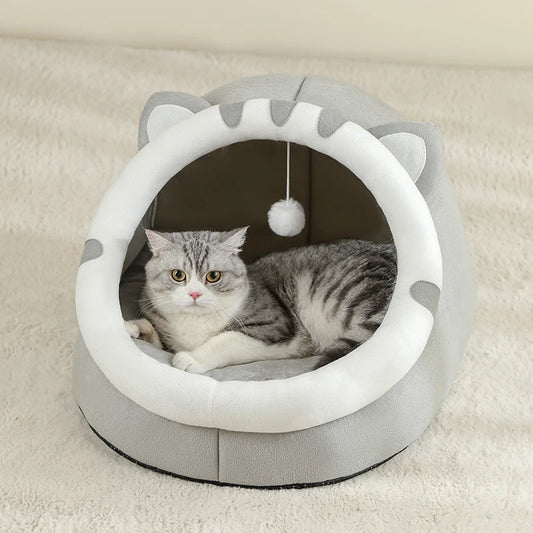 Gray cave-style cat bed with removable cushion