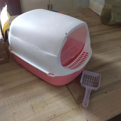 Cat using semi-enclosed litter box anti-splash design