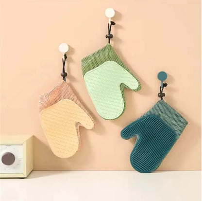 Loose fur collected on pet hair removal glove