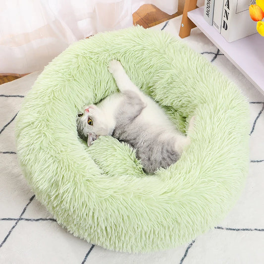 Round green plush pet bed – top view
