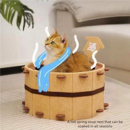 Cat resting inside felt bathtub-style cat house