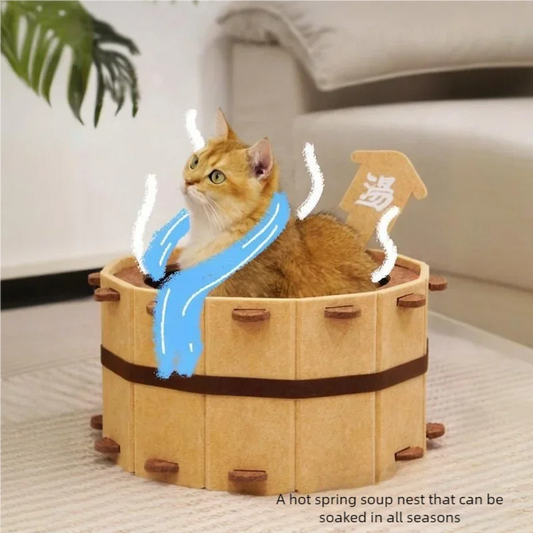 Cat resting inside felt bathtub-style cat house