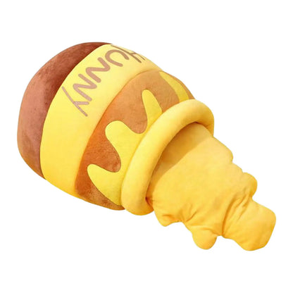 Small dog resting in cartoon honey jar shaped pet house