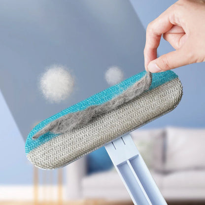 Close-up of pet hair remover tool removing fur from carpet