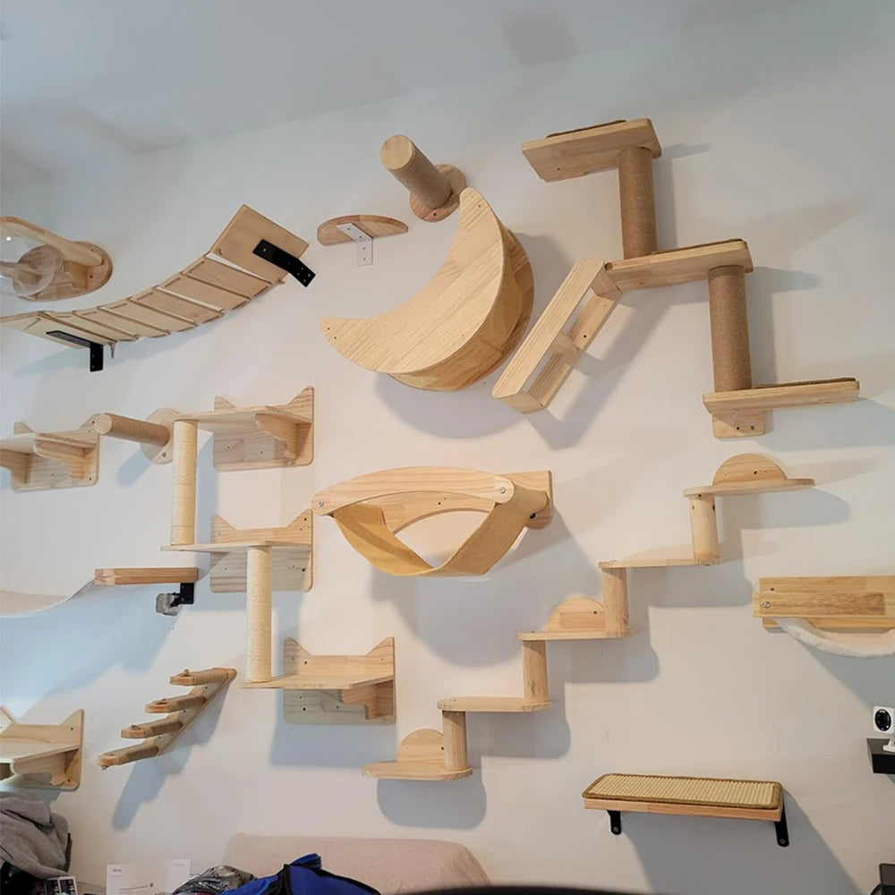 Wall-mounted wooden cat climbing shelves – modular set with hammocks and bridges