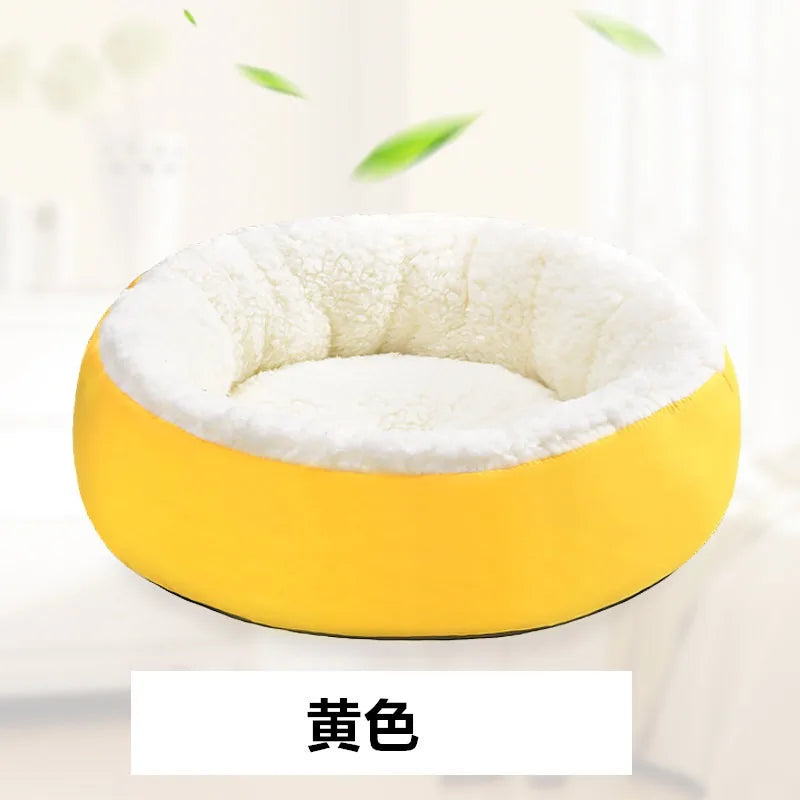 Cat sleeping in round plush bed – cozy and warm nest