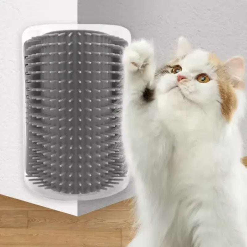 Cat rubbing against self-groomer wall corner brush