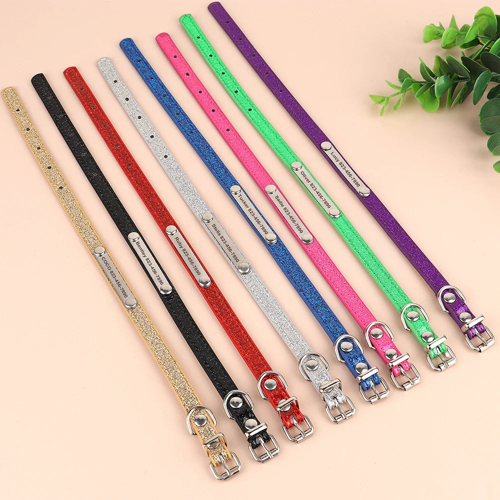 Stack of multiple collars (various colors) → "Custom bling dog and cat collars in assorted colors with engraved nameplates"