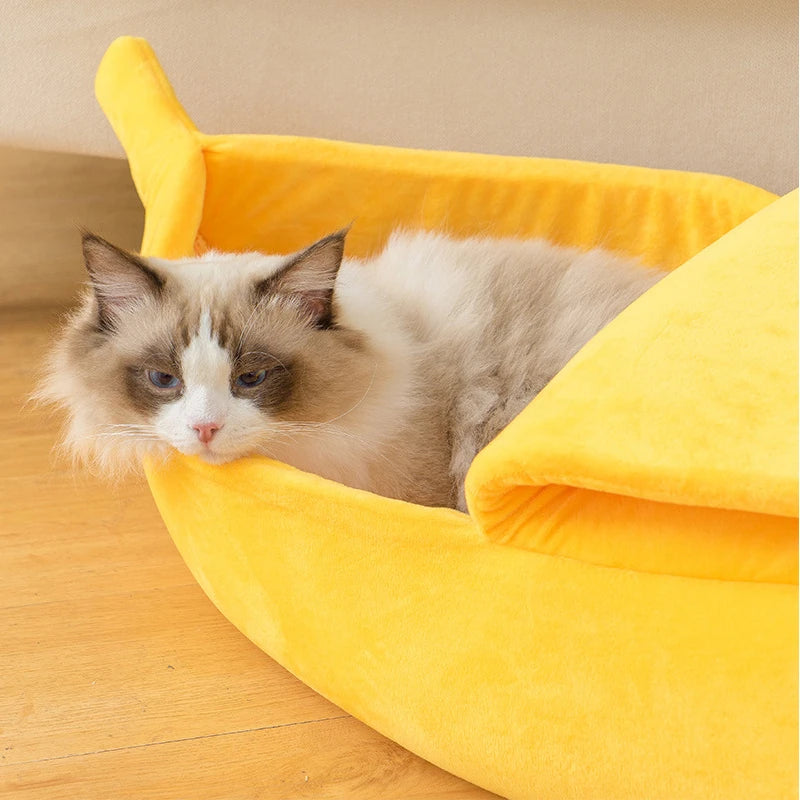 Cozy plush banana-shaped dog and cat bed in multiple colors