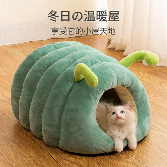 Cat inside green pumpkin pet nest – semi-enclosed bed for comfort